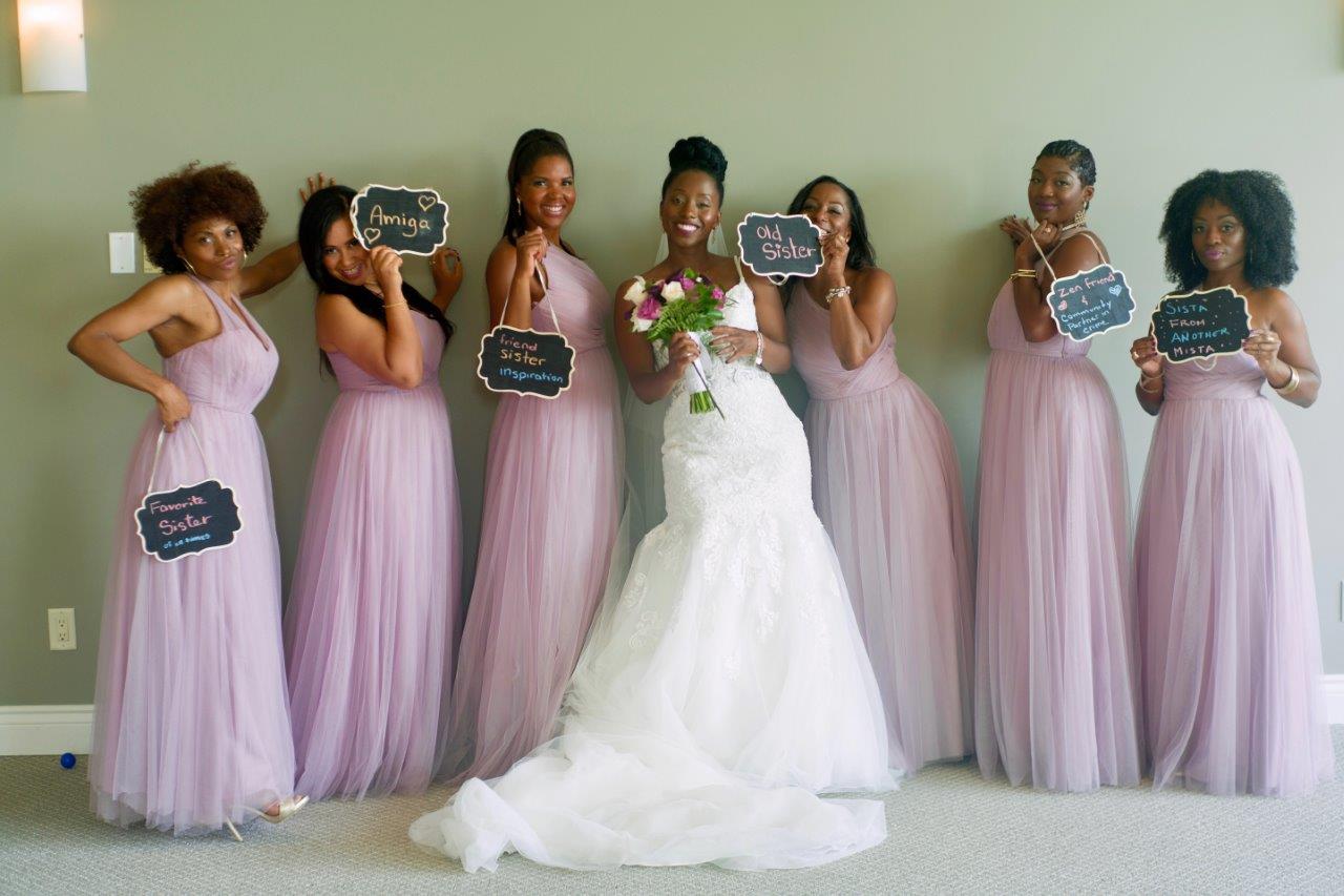 kathi robertson wedding le belvedere bridal party with signs
