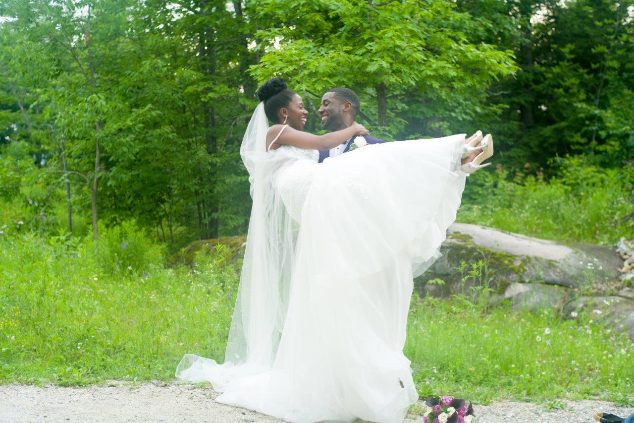 kathi robertson wedding le belvedere groom lifts bride in flowing dress